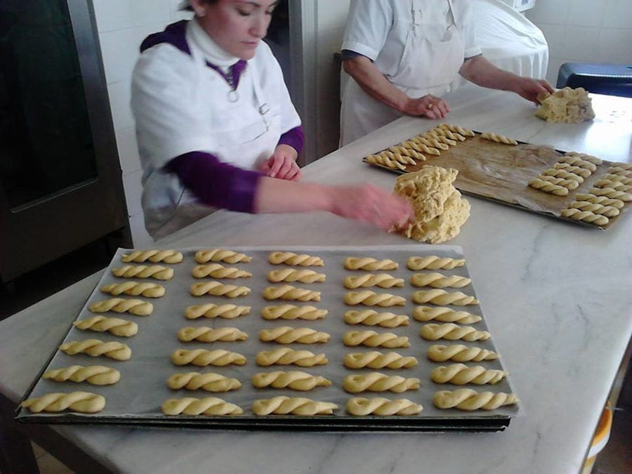 women making kuluraki'Greek Easter cookies at The Apolloniatisses workshop